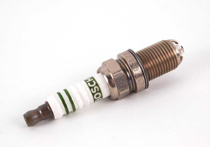 Bujía de encendido OEM 12129069877 para BMW E36, Z3. Original BMW.