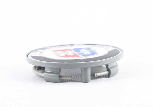 Cubierta de cubo con plaquita sujetada OEM 36138025861 para BMW 5' G30, 7' F01, X7 G07... y más. Original BMW.