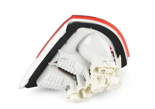 Luz trasera en tapa maletero izquierda OEM 63217160063 para BMW Serie 3 E91. Original BMW.