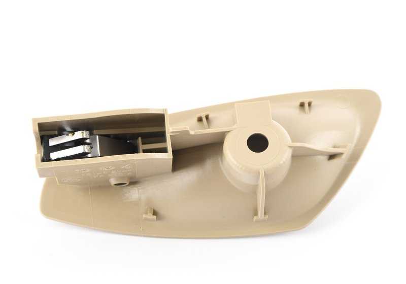 Manecilla interior izquierda para puerta OEM 51417141063 para BMW Z4 E85, E86. Acabado en color beige. Pieza original BMW.