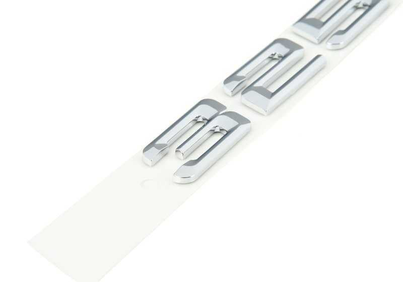 Emblema trasero adhesivo OEM 51147045697 para BMW E46 (incluye 325Xi y otros modelos compatibles). Original BMW.