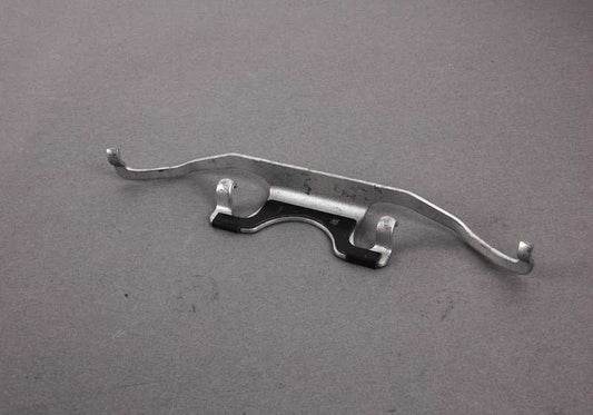 Resorte de sujeción de pastillas de freno OEM 34111164611 para BMW E39. Original BMW.