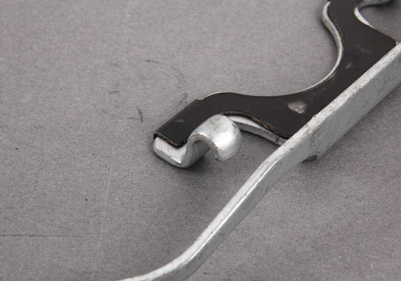 Resorte de sujeción de pastillas de freno OEM 34111164611 para BMW E39. Original BMW.