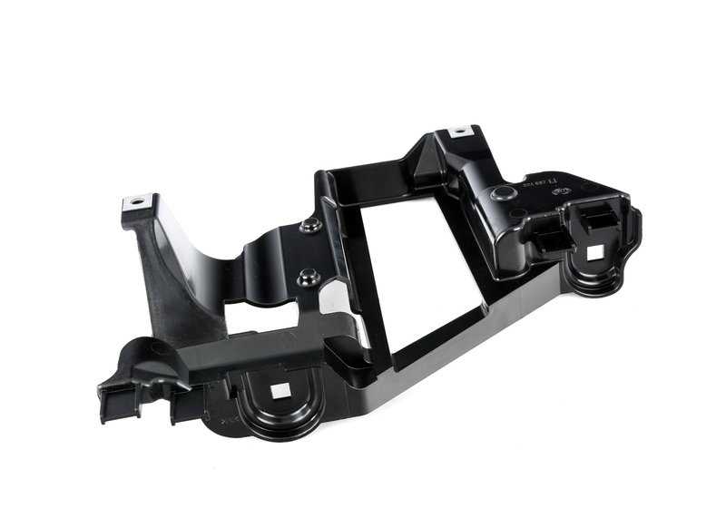 Soporte izquierdo para faro delantero OEM 63126927797 para BMW X5 E53. Recambio original BMW.
