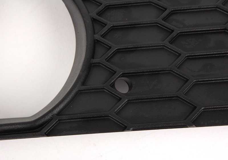 Moldura izquierda para faro antiniebla OEM 51113414311 para BMW E83. Original BMW.