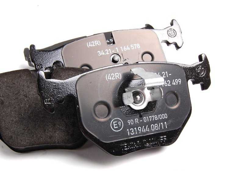 Juego de pastillas de freno traseras sin asbesto OEM 34216761248 para BMW E46, E39, E38, E53, E85, E86, E52. Original BMW.