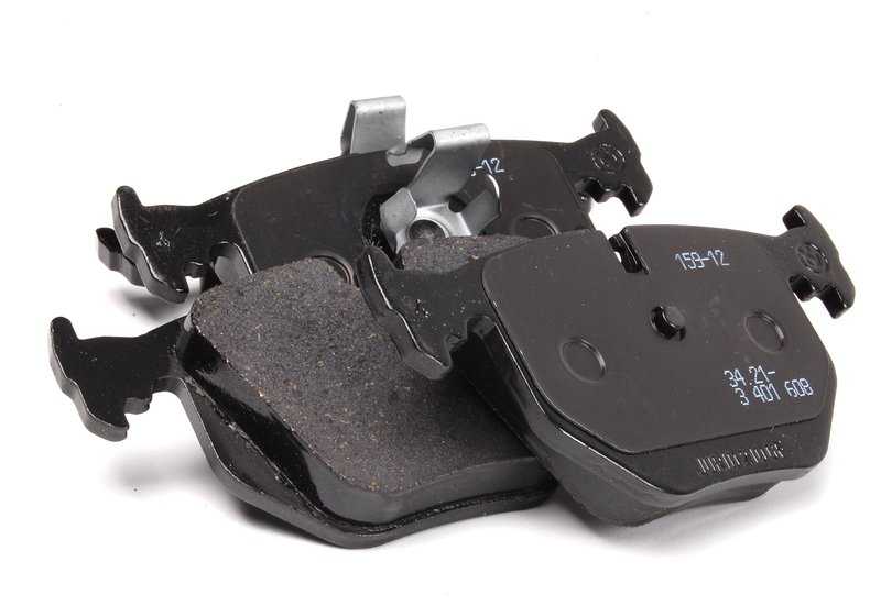 Juego de pastillas de freno traseras sin amianto OEM 34213403241 para BMW X3 {E83}. Compatible con todos los modelos E83 indicados. Producto original BMW.
