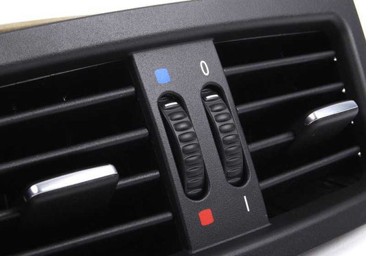 Rejilla salida aire trasera OEM 64229112207 para BMW E60 (Modelos: 520Li, 520d) del 2007 al 2010. Color negro. Pieza original BMW.