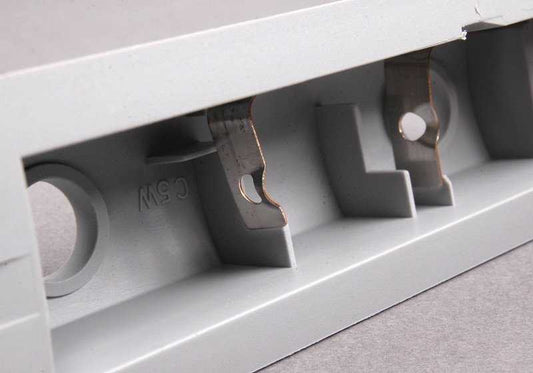 Luz de cortesía del suelo OEM 63318352831 para BMW Serie 7 E38 (1994-2001). Original BMW.