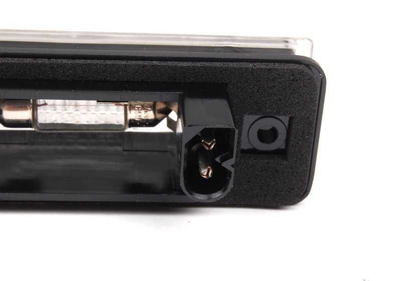 Luz de matrícula OEM 63261383049 para BMW E31. Original BMW.