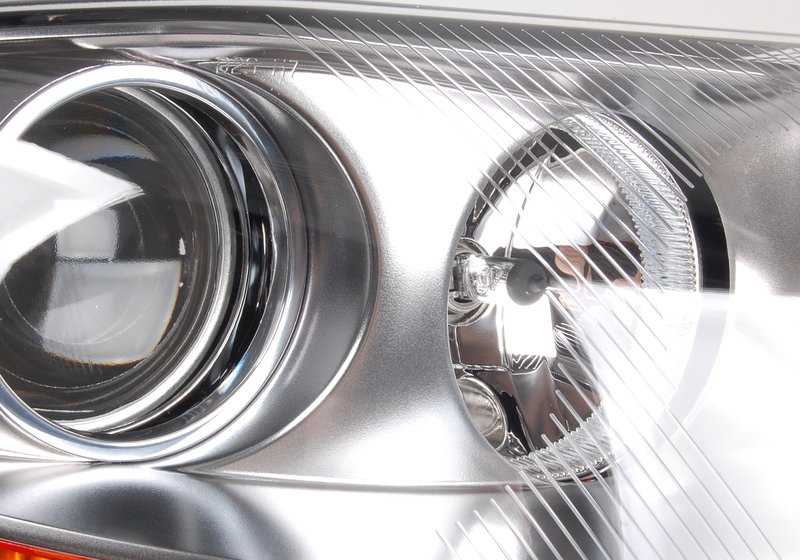 Faro delantero derecho con acabado cromado OEM 63127165666 para BMW E85 (Z4). Original BMW.