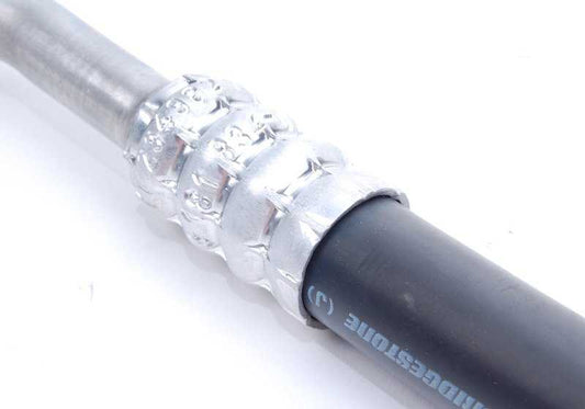 Pipe ad alta pressione dal compressore al condensatore OEM 64509181834 per BMW E60, E61, E63, E64. Compatibile con modelli 540i e 550i. BMW di riserva originale.