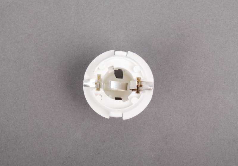 Original BMW OEM 63216943036 lamp holder for BMW E65, E66, E83, E53, E70. Compatible with all listed models.