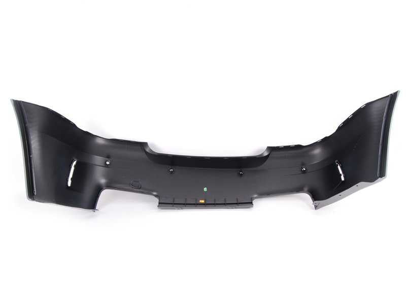 Parachoques trasero imprimado OEM 51128053878 para BMW E82. Compatible con sensores de aparcamiento (PDC). Original BMW.