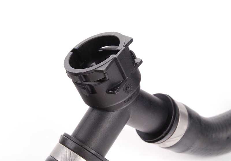 Tubería de retorno calefacción termostato OEM 17127548223 para BMW E81, E82, E87, E88, E90, E91, E92, E93. Original BMW.