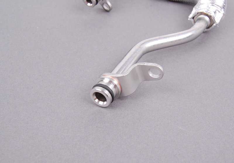 Tubo de retorno de refrigeración turbo OEM 11537558903 para BMW E82, E88, E90, E90N, E91, E91N, E92, E93, E60N, E61N, E89. Original BMW.
