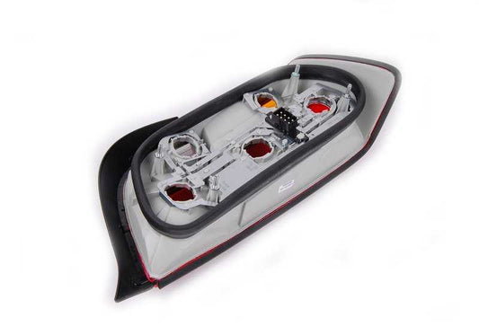Left rear pilot with Tiniebla light OEM 63218353285 for BMW E36. Original BMW.
