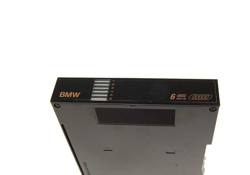 Cargador de CDs OEM 65128355885 para BMW E34, E32, E38, E31. Compatible con radios BMW originales con cambiador de 6 discos. Original BMW.
