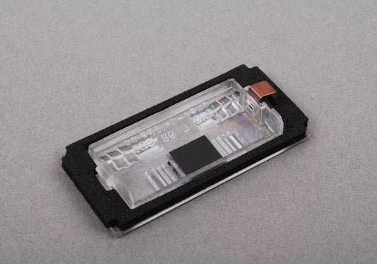 Headlight shield for BMW 3 Series E46 (OEM 51137031085). Original BMW