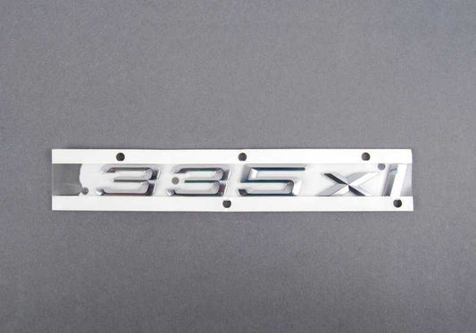 Emblema adhesivo trasero OEM 51147074722 para BMW Serie 3 E90 335xi xDrive. Original BMW.