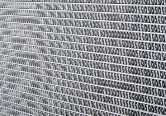 Radiador de refrigerante OEM 17111436062 para BMW E39 (M5), E38 (750i, L7), E52. Compatible con motores S62 y M73. Original BMW.