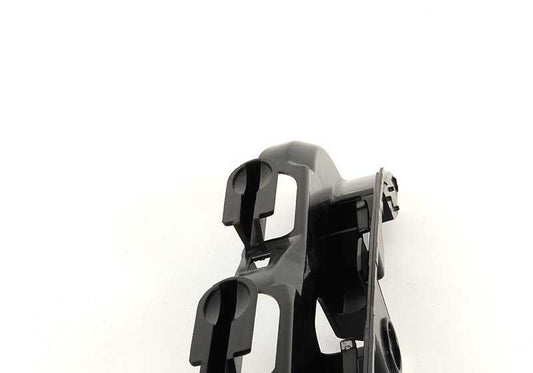 Guía derecha paragolpes delantero OEM 51127030614 para BMW E46. Original BMW.