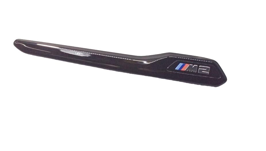 Zierleisten M Performance negras brillo OEM 51712459286 para BMW F87 M2. Mejora estética lateral con diseño deportivo. Original BMW.