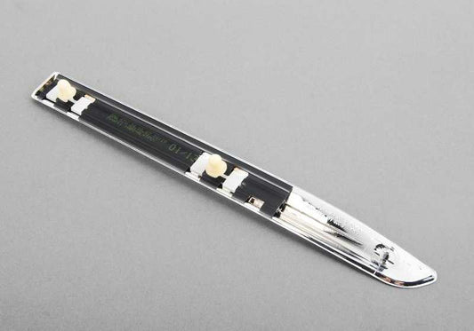 Listón parachoques lateral delantero izquierdo OEM 51138238875 para BMW Serie 3 E46 (316Ci, 318Ci, 320Ci). Original BMW.