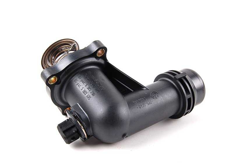 Thermostat with OEM housing 11531437085 for BMW E36, E46 and Z3. Compatible with M43 engines. Original BMW spare.