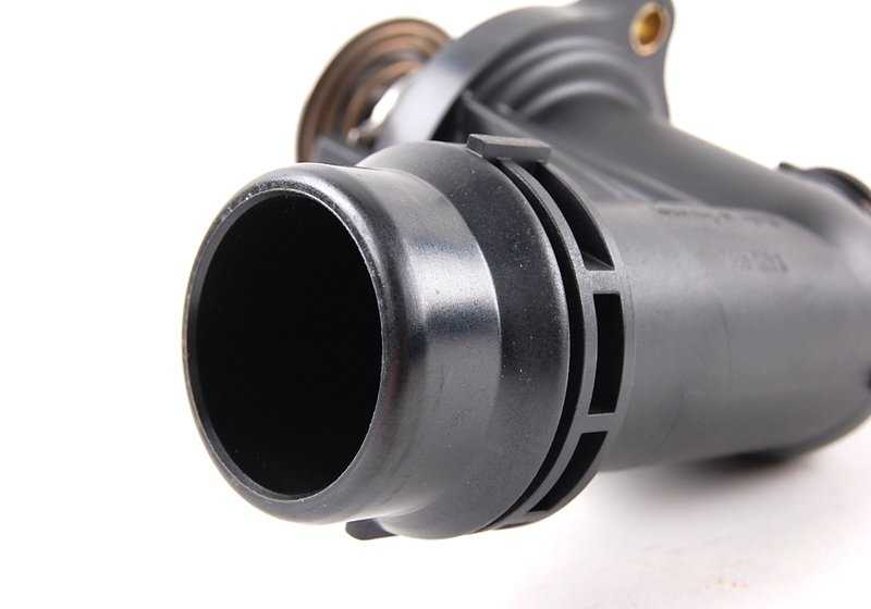 Thermostat with OEM housing 11531437085 for BMW E36, E46 and Z3. Compatible with M43 engines. Original BMW spare.