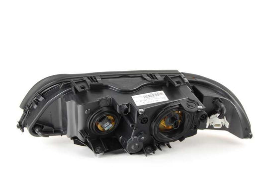 Right headlight for BMW E39 (OEM 63128385092). Genuine BMW