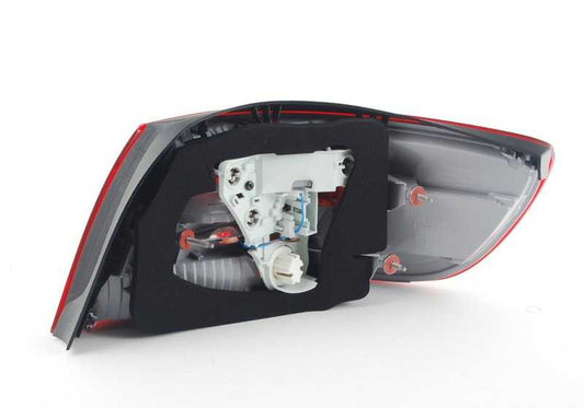 Luz trasera izquierda OEM 63217162301 para BMW Serie 3 E93 (320d, 320i). Original BMW.