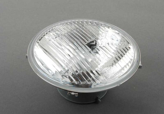 Óptica izquierda faro corto (luz de cruce) OEM 63121369851 para BMW E28 y E23. Recambio original BMW.
