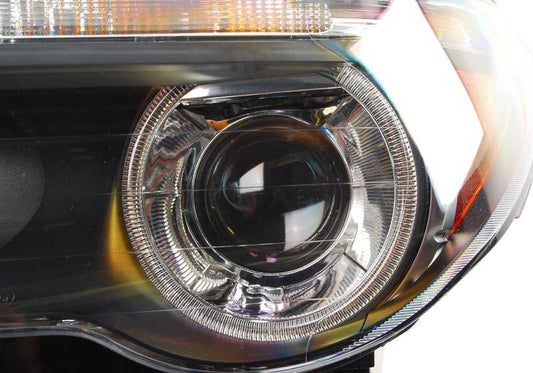 Faro Xenon izquierdo con indicador de dirección blanco OEM 63127165455 para BMW Serie 7 E65, E66. Original BMW.