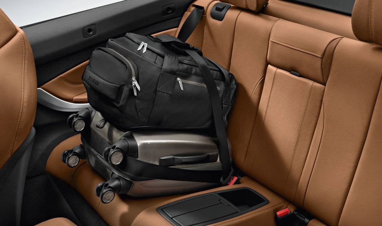 BMW OEM travel set 52212285522 with trolley and bag for BMW F20, F21, F22, F23, F30, F31, F32, F33, F34, F36, F45, F46, F83, G30, G31, F12, G32, G11, G12, F48, F39, F39, F F26, E89. Original BMW.