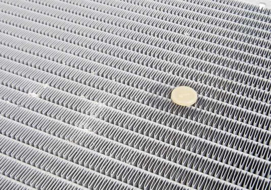 OEM cooling radiator 1711247345 for BMW E39 (520d, 525d) and E38 (725d, 730d). Compatible with M47 and M57 engines. Original BMW.