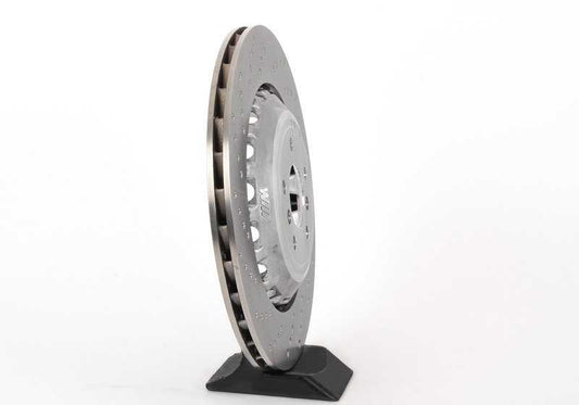 Disco de freno ventilado y perforado izquierdo OEM 34212284103 para BMW F10, F06, F12, F13. Original BMW.