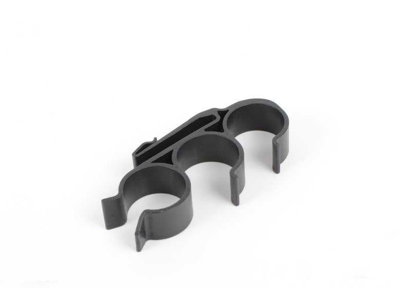 Soporte de manguera OEM 64218386477 para BMW E46. Original BMW.