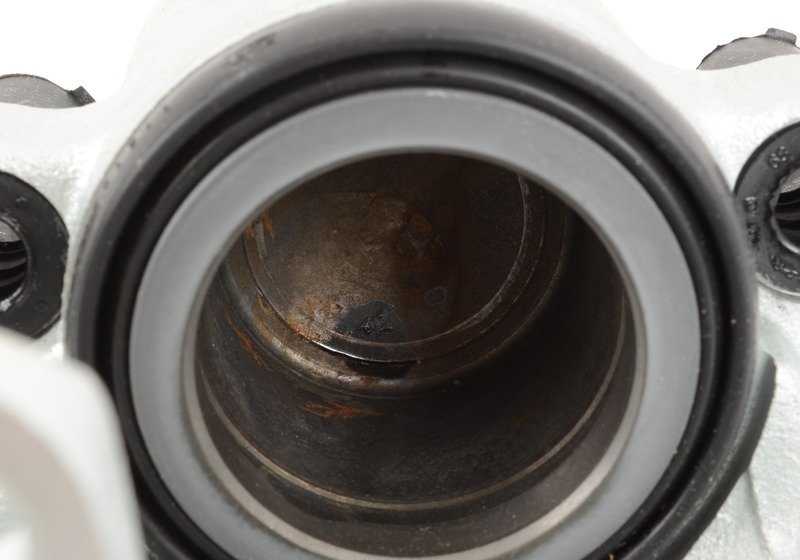 Carcaça da pinça esquerda para BMW E39, E38, E83N, E53 (OEM 34116773131). BMW original