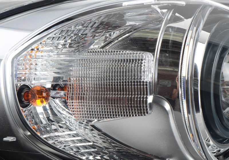 AHL-Xenon Headlight Right for BMW E70N (OEM 63127298452). Original BMW