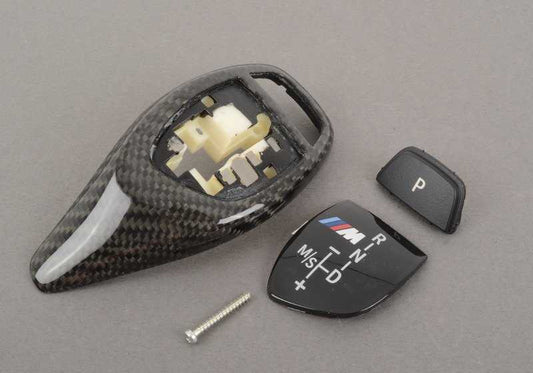 Embellecedor palanca cambios M Performance carbono OEM 61312250703 para BMW F10, F11, F06, F12, F13. Compatible con modelos con cambio automático deportivo. Original BMW.