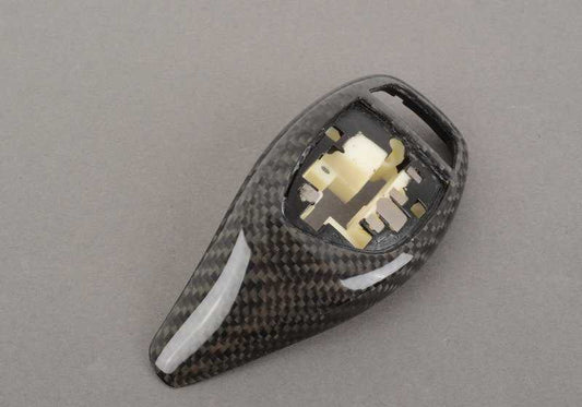 Embellecedor palanca cambios M Performance carbono OEM 61312250703 para BMW F10, F11, F06, F12, F13. Compatible con modelos con cambio automático deportivo. Original BMW.