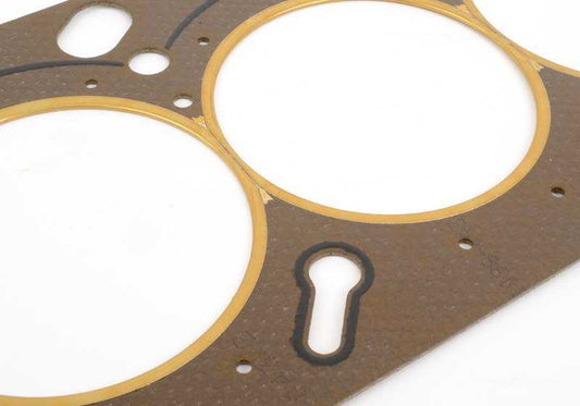 Junta de culata sin amianto OEM 11121404497 para BMW E31 850CSi (motor S70). Compatible con modelos fabricados entre 1992 y 1996. Pieza original BMW.