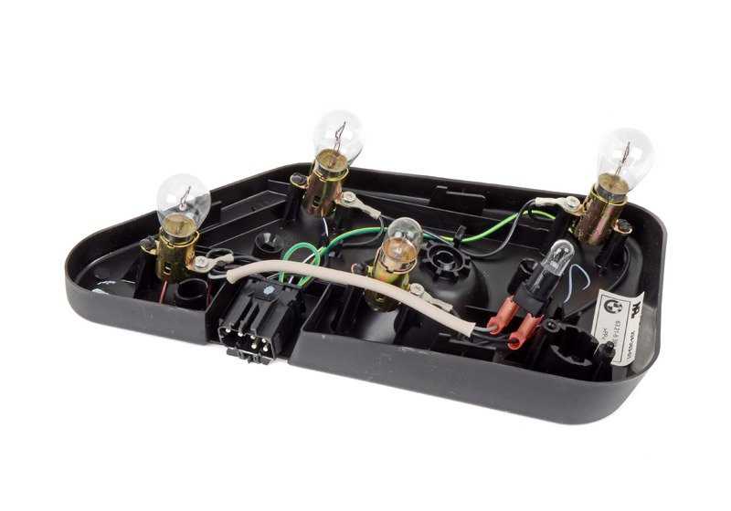 Portabombillas trasero izquierdo OEM 63218389861 para BMW E36, Z3. Original BMW.