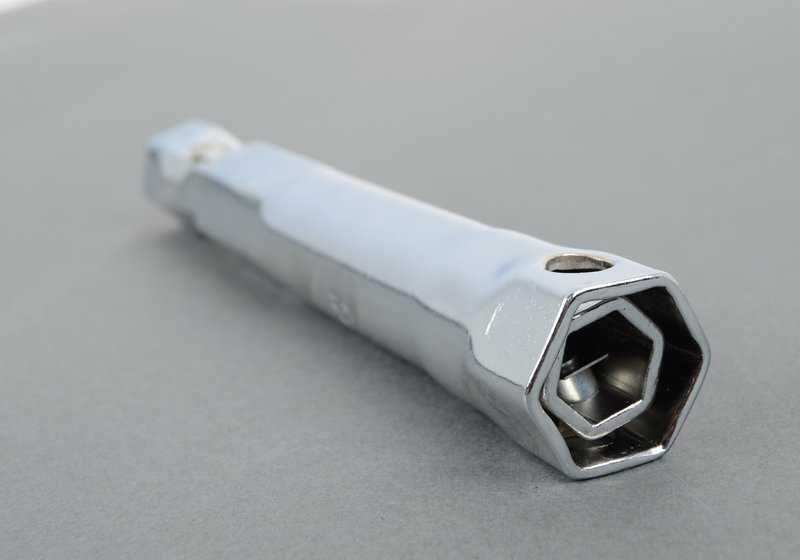 Adjustable Spark Plug Wrench for BMW 3 Series E30, 5 Series E28, 6 Series E24 (OEM 71112225101). Original BMW