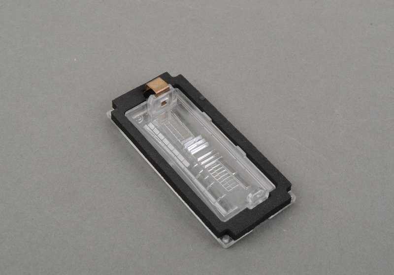 Lente de luz para maneta del portón trasero OEM 51137165524 para BMW E65, E66. Original BMW.
