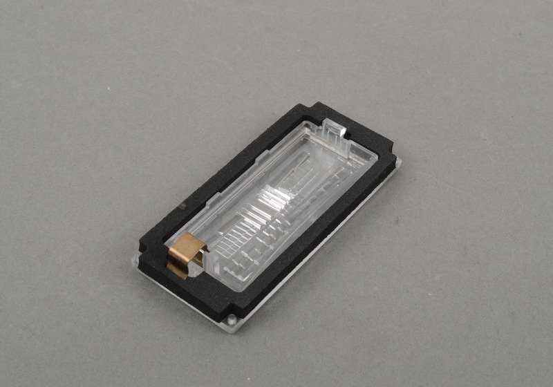 Lente de luz para maneta del portón trasero OEM 51137165524 para BMW E65, E66. Original BMW.