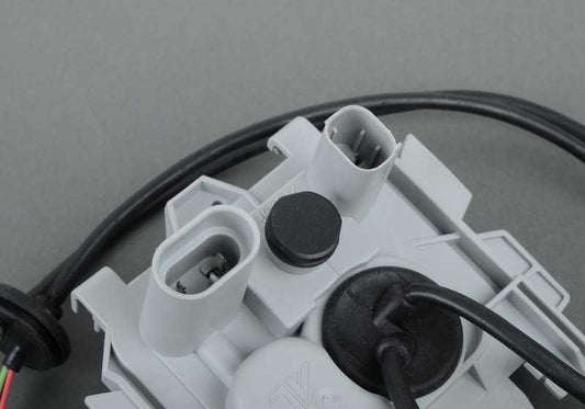 Soporte izquierdo centralita luz Xenón OEM 63126924283 para BMW E46. Original BMW.