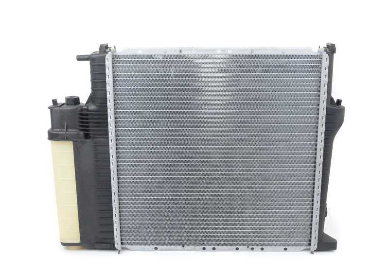 Radiador de agua con enfriador de aceite de la transmisión para BMW Serie 3 E36 (OEM 17111723528). Original BMW