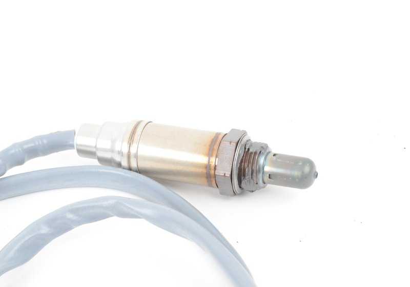 Sonda lambda OEM 11787513963 para BMW E60, E61, E65, E66, E83, E85. Control de emisiones para motor. Longitud 990mm. Original BMW.